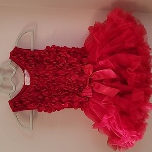 Little girls red tutu, never worn missing tags.